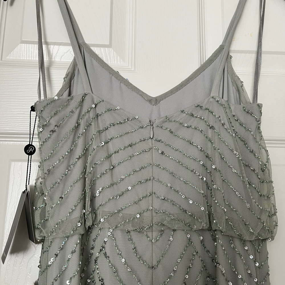 Never worn Adrianna Papell Beaded Gown
Tags attached
Size 6
Color mint - Picture 5 of 7